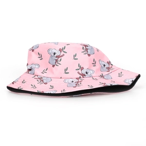 Detailed view of pink cotton bucket hat with cute koala pattern and black lining