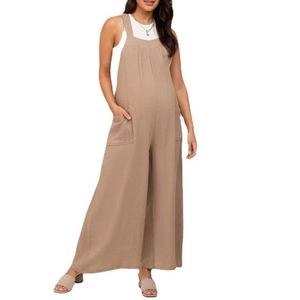 Detail of beige maternity wide-leg pants with adjustable waistband and linen texture