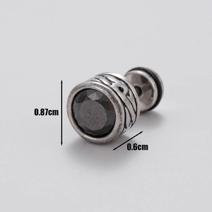 Macro detail of men's vintage steel earring with black zircon showing 0.87cm size