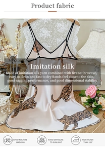 Detail of leopard print satin nightgown showing the silky texture and elegant V-neck design