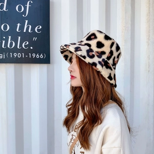 Detail of soft leopard print faux fur texture on a warm winter bucket hat for women