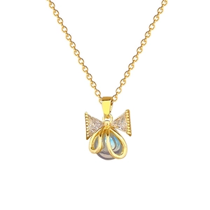 Titanium steel necklace with crystal bow pendant and blue halo pearl detail