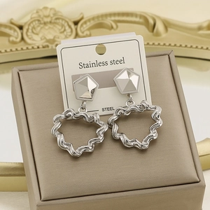 Vintage geometric stainless steel earrings with heart charms and wavy textured finish