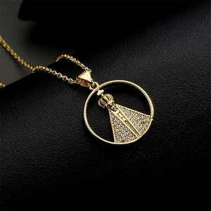 Religious pendant necklace in gold finish with micro-inlaid cubic zirconia on leather