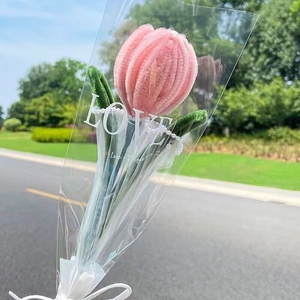Handmade pink pipe cleaner tulip bouquet in clear LOVE gift wrap with white ribbon