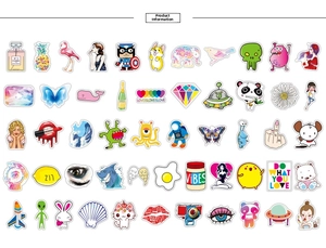 Flat lay of 50 VSCO style stickers featuring colorful pop art icons and cartoon patterns