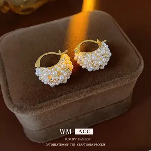 French court style gold hoop earrings featuring crystal accents and pavé white pearls