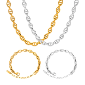 Detail of gold and silver coffee bean link chain set with lobster clasp and extension