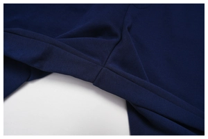 Detail of high-waisted sweatpants showing reinforced crotch stitching and fabric texture