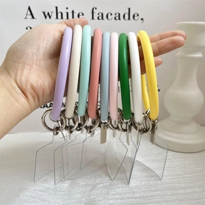 Multi-color silicone phone wrist straps with metal buckles and transparent PVC patches