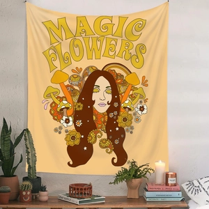 Detail of bohemian retro tapestry featuring floral art and Magic Flowers text design