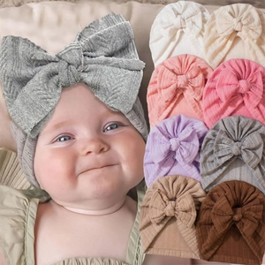 Soft knitted baby turban hats with large bows in multiple colors for infant girls