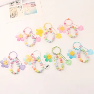 Colorful DIY macaron sunflower keychain set with heart pendants and letter beads