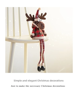 Close-up of a Christmas reindeer doll with long legs in red and black plaid fabric design