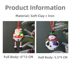 Detail view of handmade polymer clay Santa and snowman bell ornaments on a Christmas tree