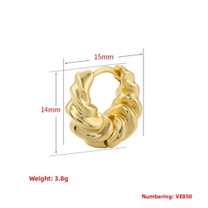 Detail view of twisted croissant earrings with 15mm width and 14mm height dimensions