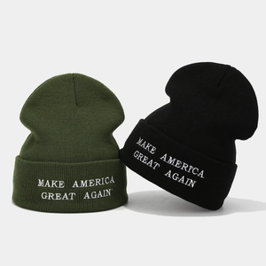 Black and army green knit beanies with white embroidered Make America Great Again slogan