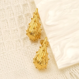 Pair of gold titanium steel earrings featuring unique asymmetric water drop thorn texture