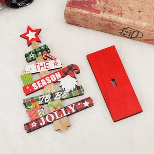 DIY wooden Christmas tree desk ornament with red base and festive greeting message