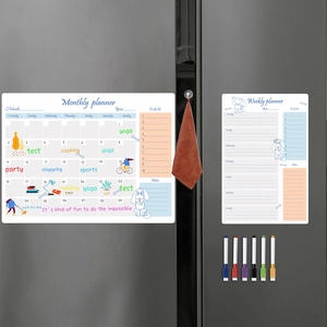 Magnetic monthly and weekly planner set with 6 markers on a double-door refrigerator