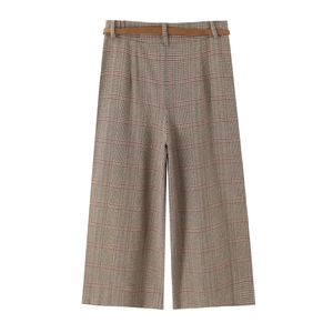 Women high waist loose houndstooth trousers with brown slim belt in flat lay view