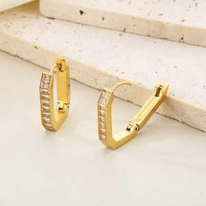 U-shaped gold geometric earrings with rectangular cubic zirconia from a 45-degree angle