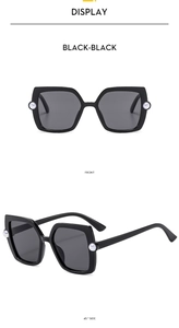 Detail view of black square sunglasses with pearl accents from front and 45-degree angles