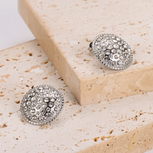 Sparkling silver round stud earrings with crystal pave setting on natural stone