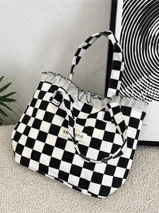 Lace-trimmed checkerboard canvas tote bag with Korean slogan in a stylish setting