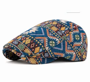 Detailed view of navy blue beret featuring ethnic geometric jacquard fabric pattern