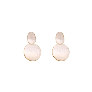 Detailed close-up of geometric gold and cream enamel layered round earrings