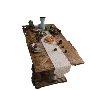 White Christmas wind chime table runner with gold stamping on a wooden table setup