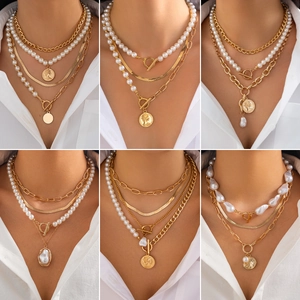 Baroque irregular pearl layered necklace with gold coin pendant and snake chain jewelry
