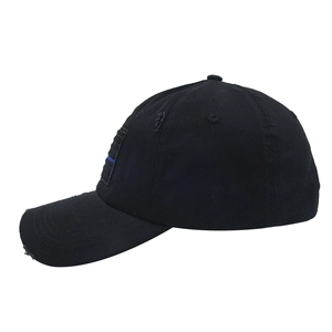 Black cotton baseball cap with American flag velcro patch and distressed vintage details