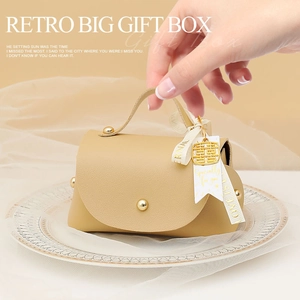 European faux leather wedding favor gift bag with golden rivet and silk ribbon decoration