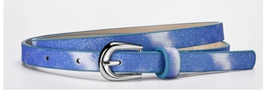 Detailed close-up of blue sequin glitter belt with polished silver pin buckle