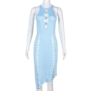 Detail of light blue sleeveless dress with rhinestone cut-outs and asymmetric hemline