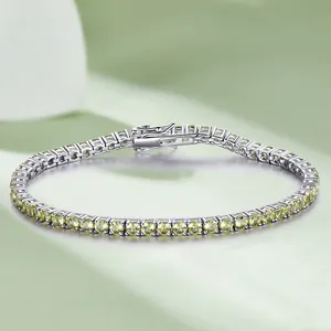 Detailed macro view of S925 sterling silver tennis bracelet with round yellow gemstones