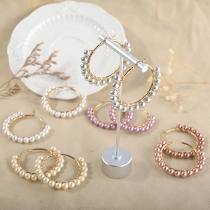 Handmade pearl beaded hoop earrings in multiple colors with gold stainless steel wire