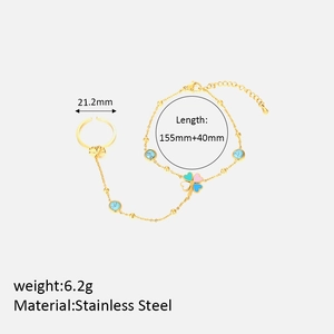 Detail der 155mm+40mm goldenen Edelstahl Ring-Armband-Kette mit blauen Perlen