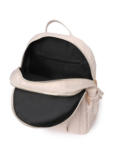Beige nylon backpack with large main compartment and internal zip pocket for travel