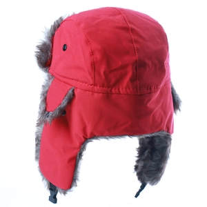Detail of red winter ushanka hat with warm gray faux fur lining and chin strap buckle