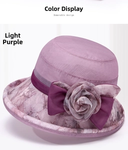 Détail du chapeau de soleil violet clair avec nœud floral et maille respirante