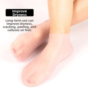 Pink silicone moisturizing heel socks with ventilation holes for dry skin repair