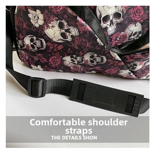 Close-up of adjustable nylon shoulder strap with skull pattern and padded shoulder cushion