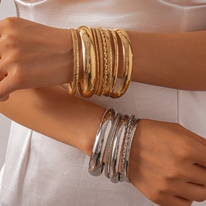 8-piece set of geometric metal bracelets with gold and silver polished textures