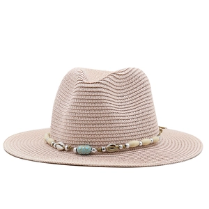 Khaki woven straw Panama hat with bohemian seashell and beaded band for beach sun protection
