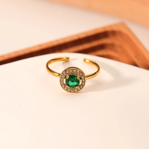 Adjustable gold titanium ring with a green emerald zircon center and white crystal halo