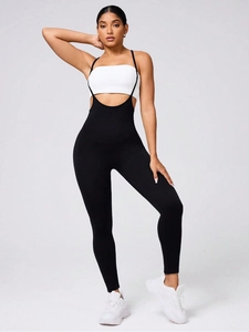 Women's backless sports jumpsuit in black and white for yoga and fitness training
