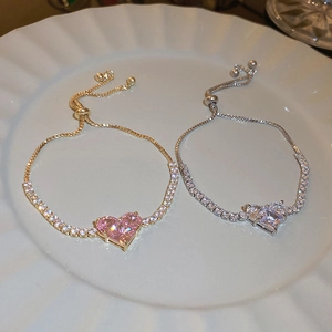 Detail of adjustable heart tennis bracelets with pink and white crystal stones